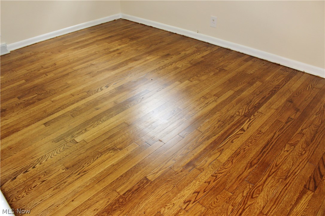 10702 Chillicothe Road Kirtland, OH 44094 - Photo 20 of 25 Newly finished hardwood floor in bedroom 3.