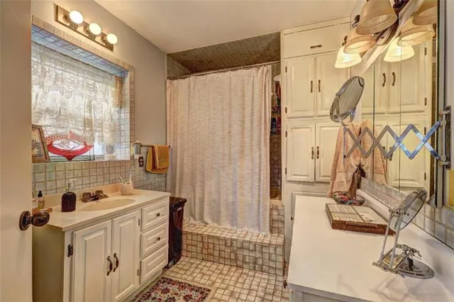 a view of a field with trees