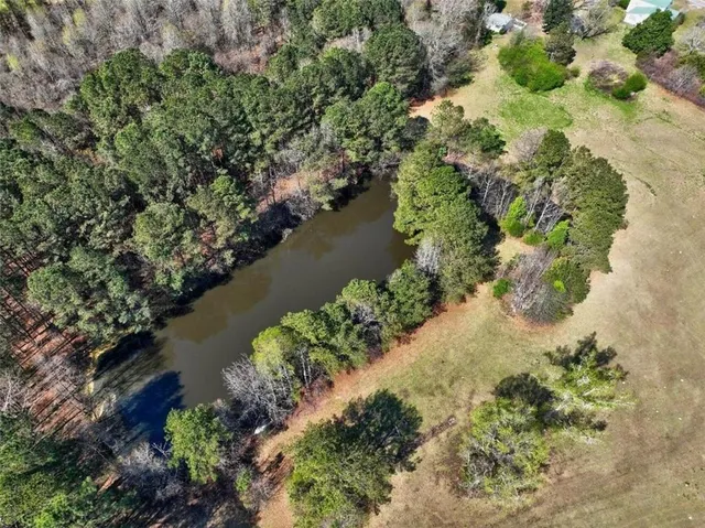 a view of a lake with a house