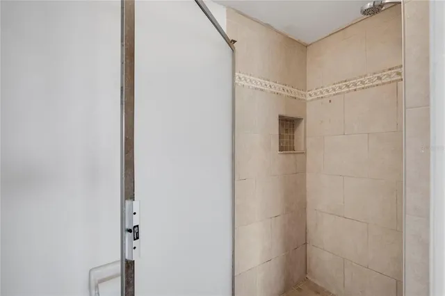 a bathroom with a granite countertop sink a mirror and a