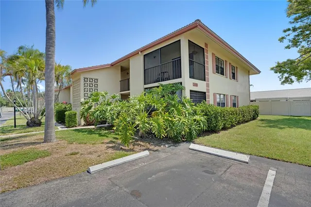 a view of a patio with swimming pool table and chairs