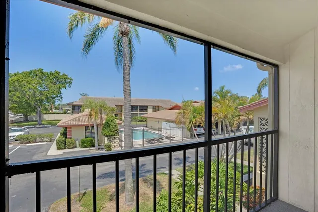 a view of a street from a balcony