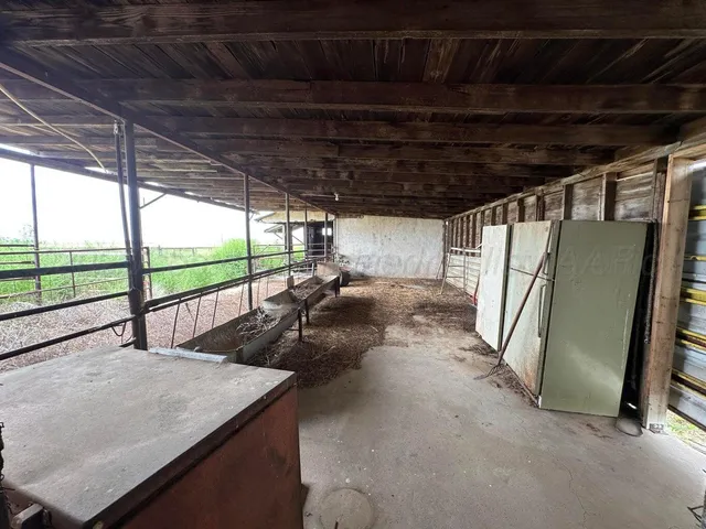 a view of a lobby with furniture and floor to ceiling window