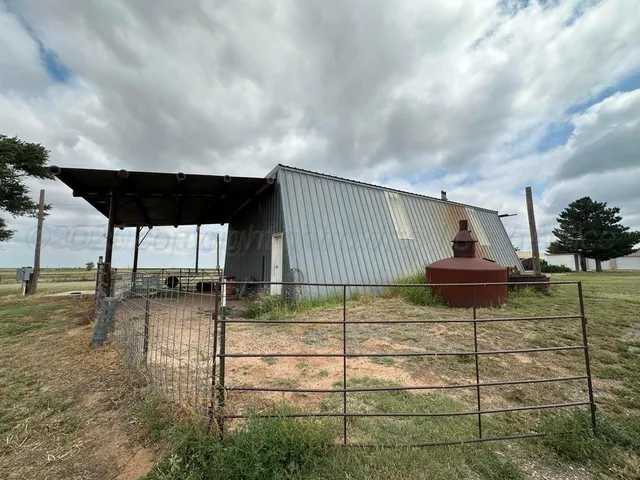 a view of a water fountain and an umbrella