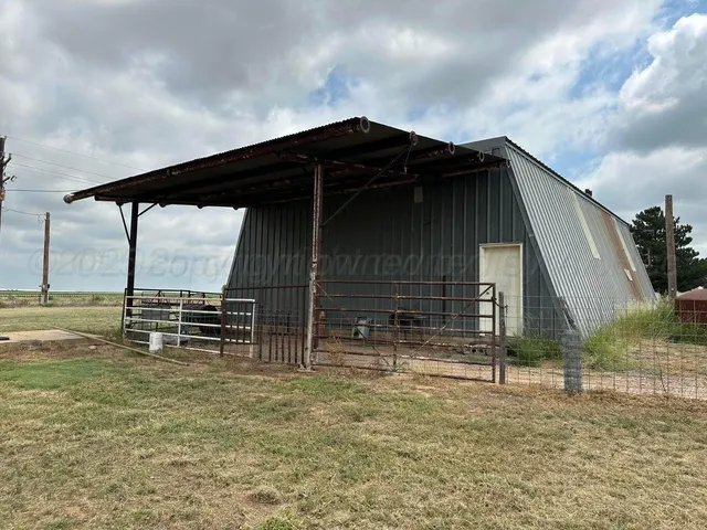 a fire hydrant in the middle of a field