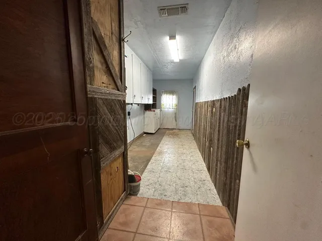 wooden floor with a rug