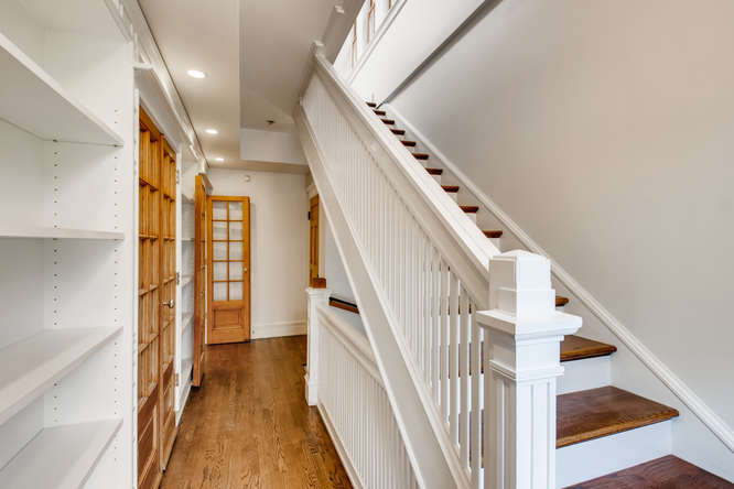 1429 West Roscoe Street Chicago, IL 60657 - Photo 14 of 65 a view of entryway with wooden floor