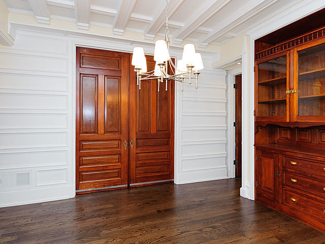 1429 West Roscoe Street Chicago, IL 60657 - Photo 31 of 65 an empty room with wooden floor closet and windows