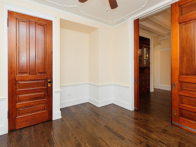 1429 West Roscoe Street Chicago, IL 60657 - Photo 32 of 65 wooden floor and an entryway in a room