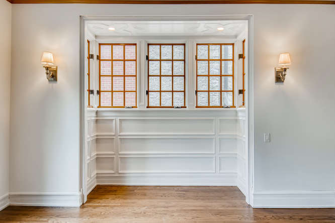 1429 West Roscoe Street Chicago, IL 60657 - Photo 5 of 65 a view of walk in closet with empty racks
