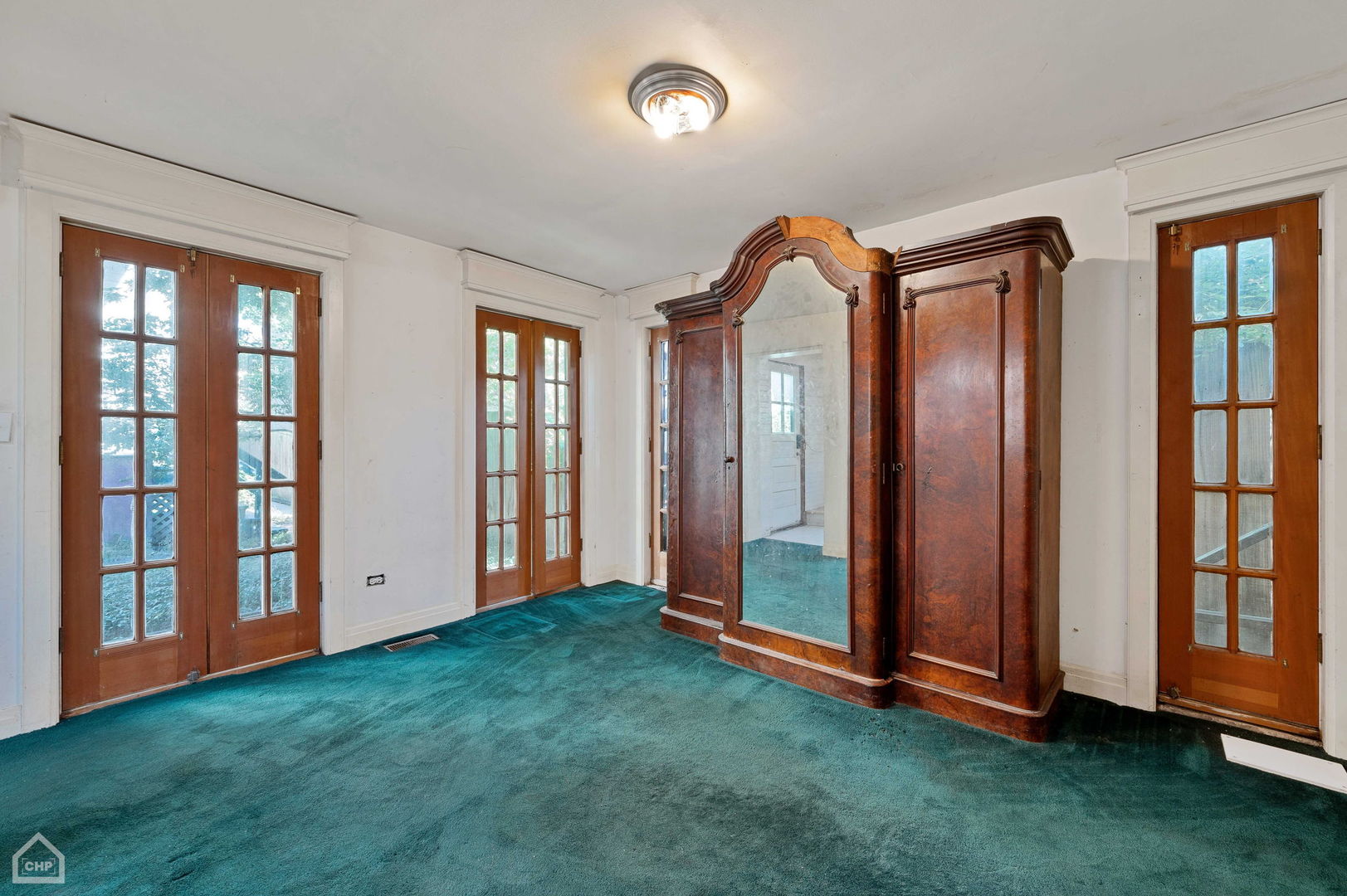 1429 West Roscoe Street Chicago, IL 60657 - Photo 56 of 65 an empty room with windows and gate