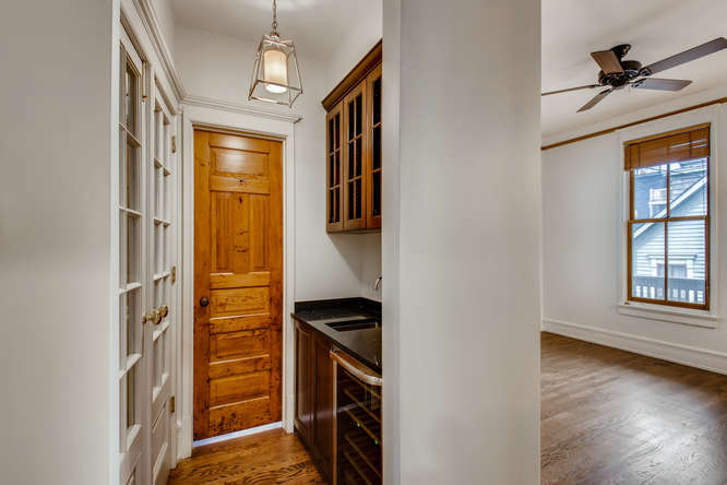 1429 West Roscoe Street Chicago, IL 60657 - Photo 10 of 65 a view of an entryway with wooden floor