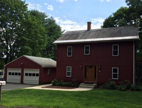 37 Evergreen Road Northampton, MA 01053 - Photo 1 of 27 a front view of a house with a garden