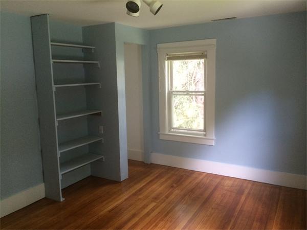 37 Evergreen Road Northampton, MA 01053 - Photo 14 of 27 a view of an empty room with a window and wooden floor