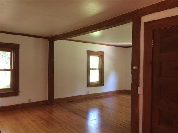 37 Evergreen Road Northampton, MA 01053 - Photo 5 of 27 an empty room with wooden floor and windows
