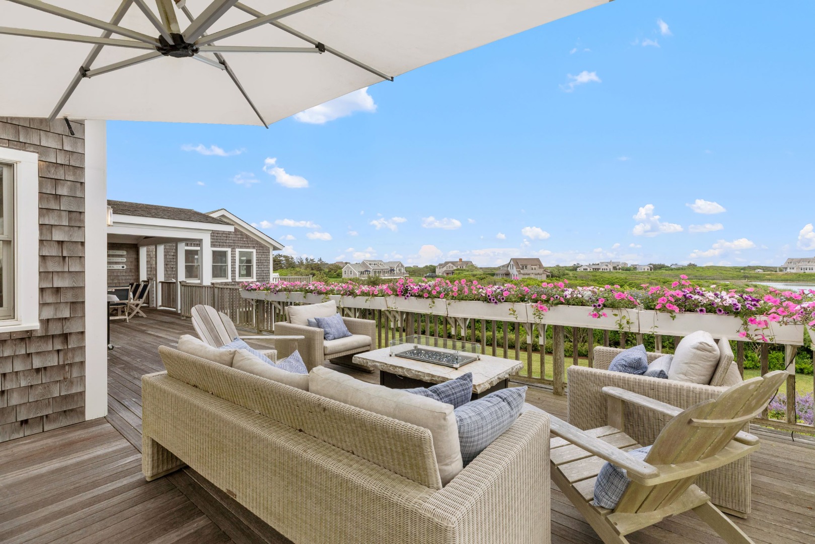 45 Starbuck Road Nantucket, MA 02554 - Photo 16 of 42 a view of a chairs and table in the terrace