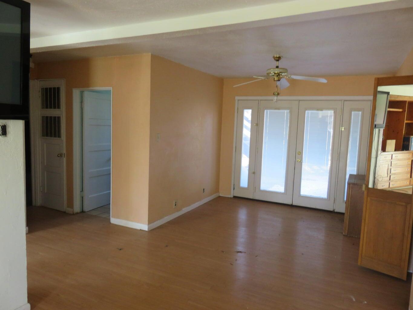 295 County Road 149 Lookout, CA 96054 - Photo 25 of 40 wooden floor in an empty room with a window