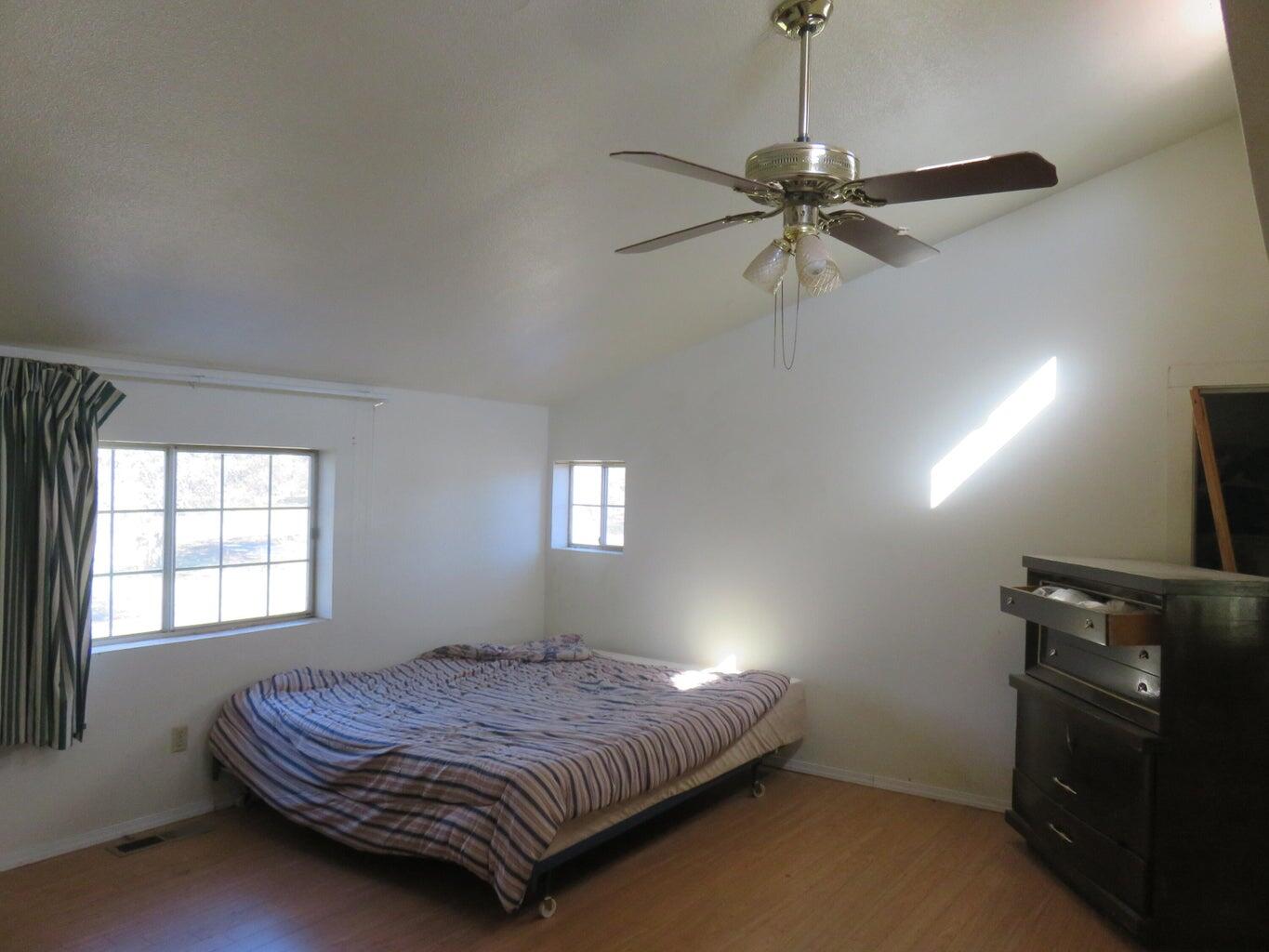 295 County Road 149 Lookout, CA 96054 - Photo 34 of 40 a bedroom with a bed and window