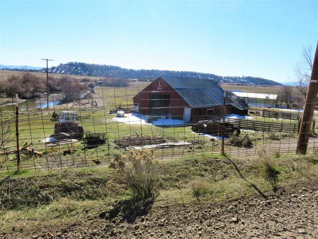 a aerial view of a house with a yard