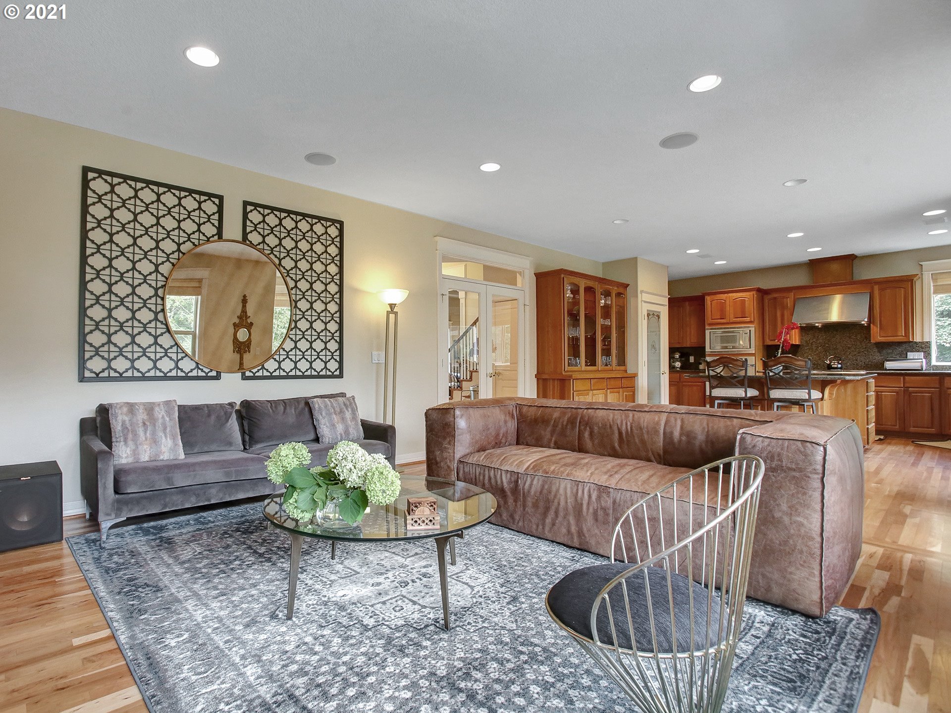 8316 Northwest Ridgetop Court Portland, OR 97229 - Photo 11 of 32 a living room with furniture and a wooden floor