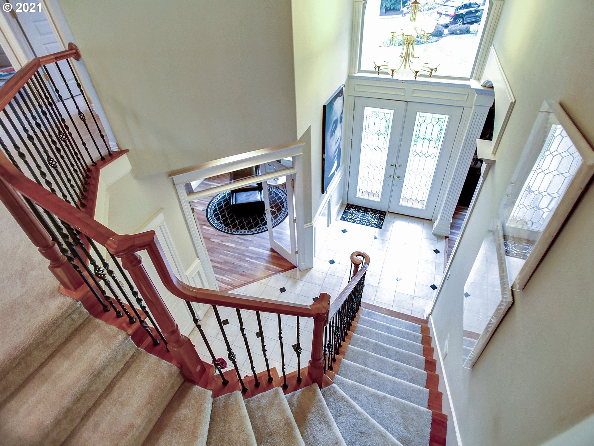 8316 Northwest Ridgetop Court Portland, OR 97229 - Photo 14 of 32 a view of an entryway wooden floor and furniture