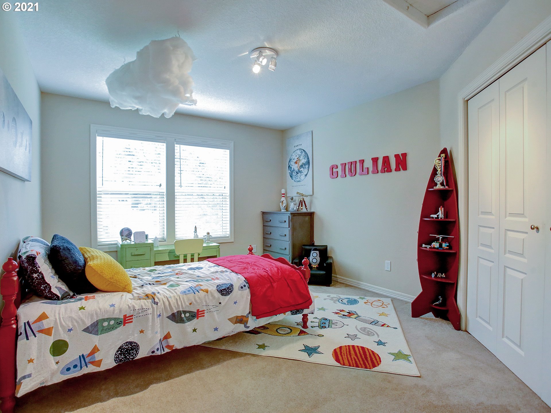 8316 Northwest Ridgetop Court Portland, OR 97229 - Photo 21 of 32 a bedroom with a bed and a window