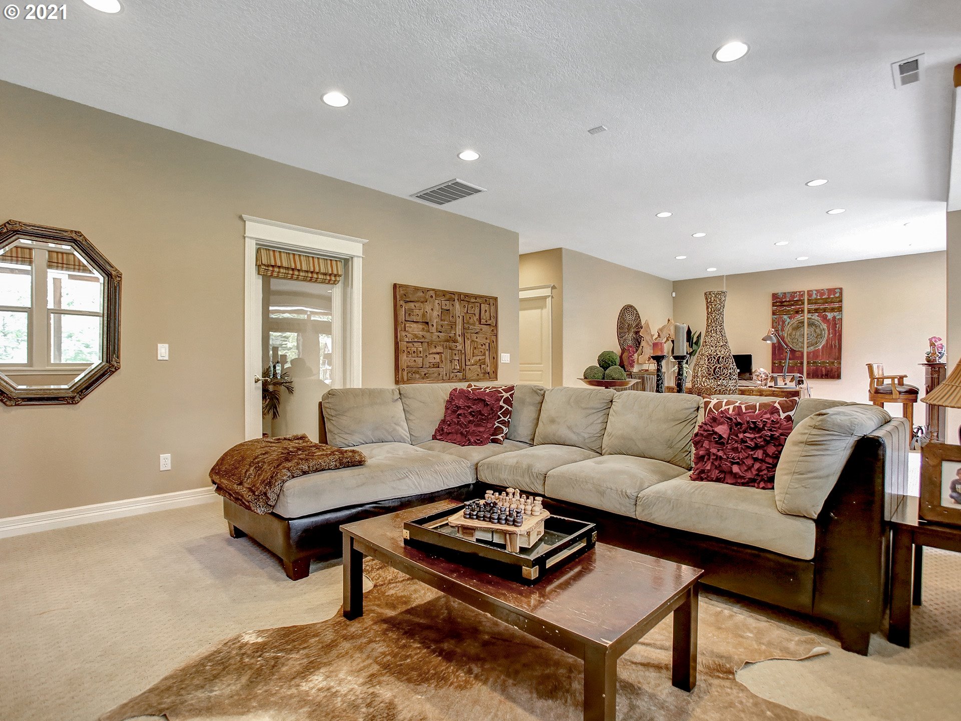 8316 Northwest Ridgetop Court Portland, OR 97229 - Photo 26 of 32 a living room with furniture and a table