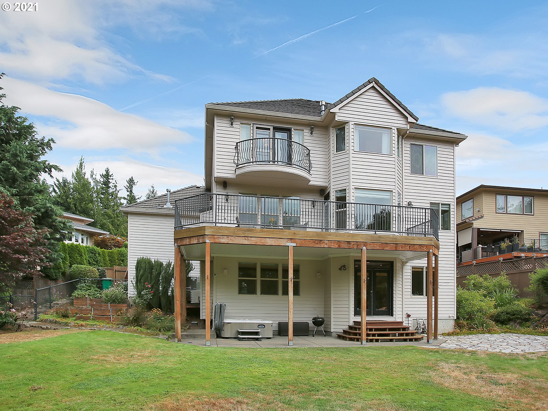 8316 Northwest Ridgetop Court Portland, OR 97229 - Photo 29 of 32 a front view of a house with a yard