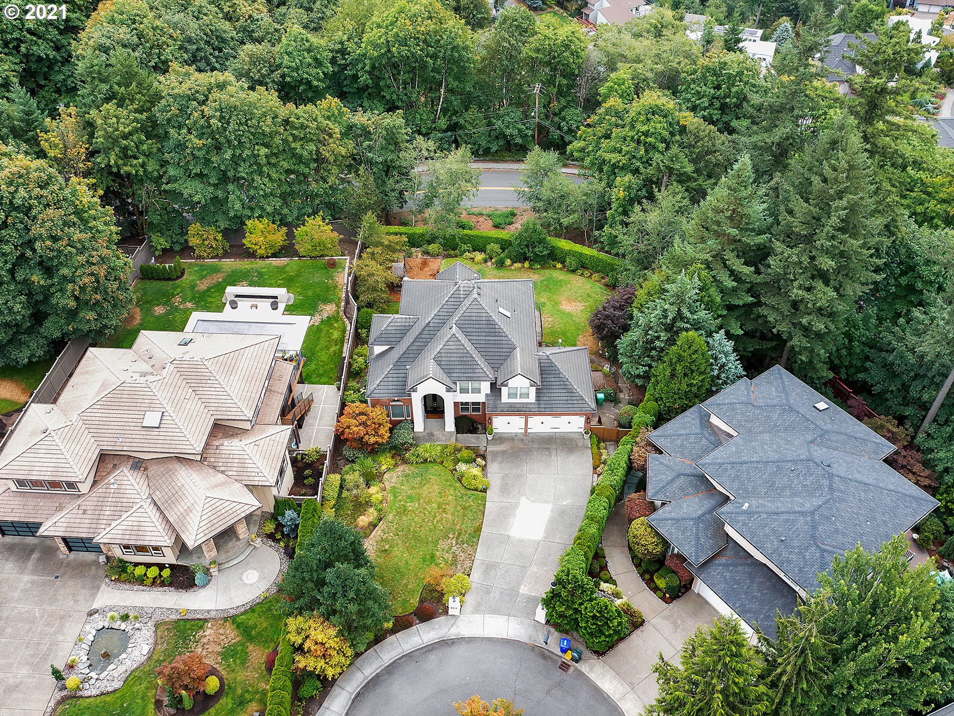 8316 Northwest Ridgetop Court Portland, OR 97229 - Photo 31 of 32 an aerial view of a house with yard swimming pool and outdoor seating