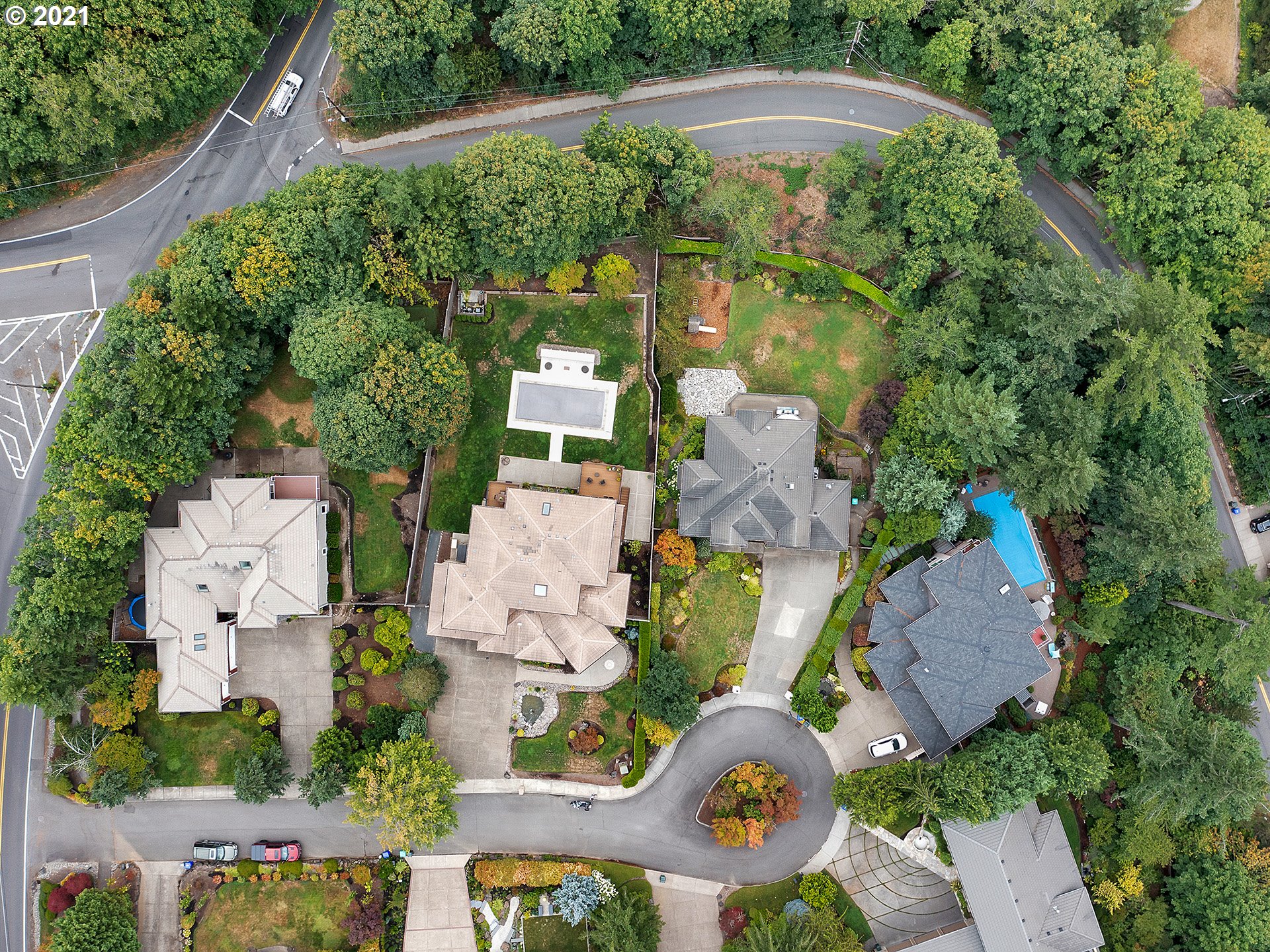 8316 Northwest Ridgetop Court Portland, OR 97229 - Photo 32 of 32 an aerial view of a house with a garden