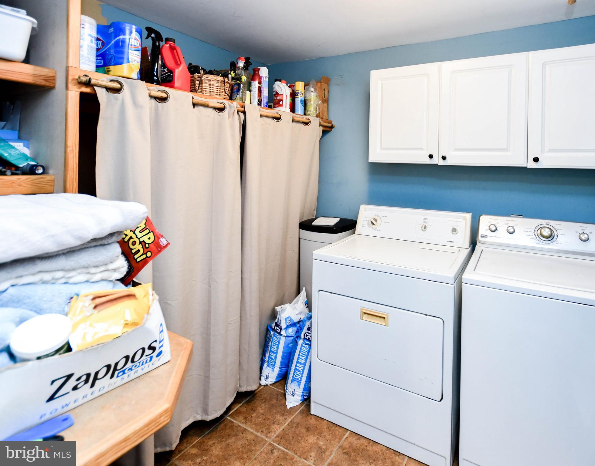 823 Selby Boulevard Edgewater, MD 21037 - Photo 25 of 40 a utility room with dryer and washer