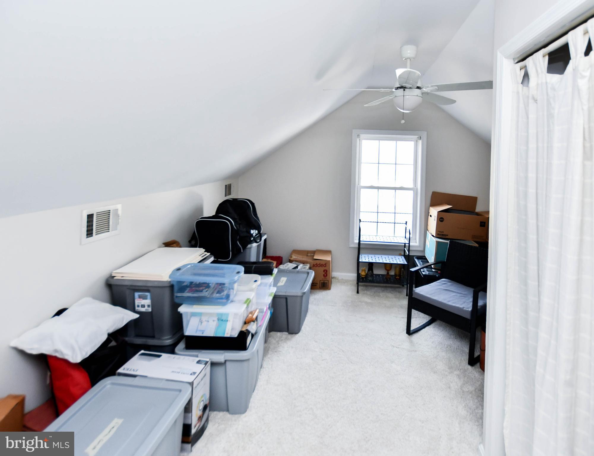 823 Selby Boulevard Edgewater, MD 21037 - Photo 28 of 40 a bedroom with furniture and a window
