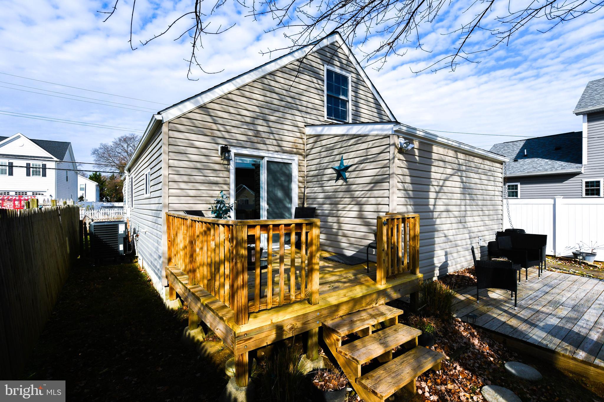 823 Selby Boulevard Edgewater, MD 21037 - Photo 29 of 40 a view of a house with backyard and sitting area
