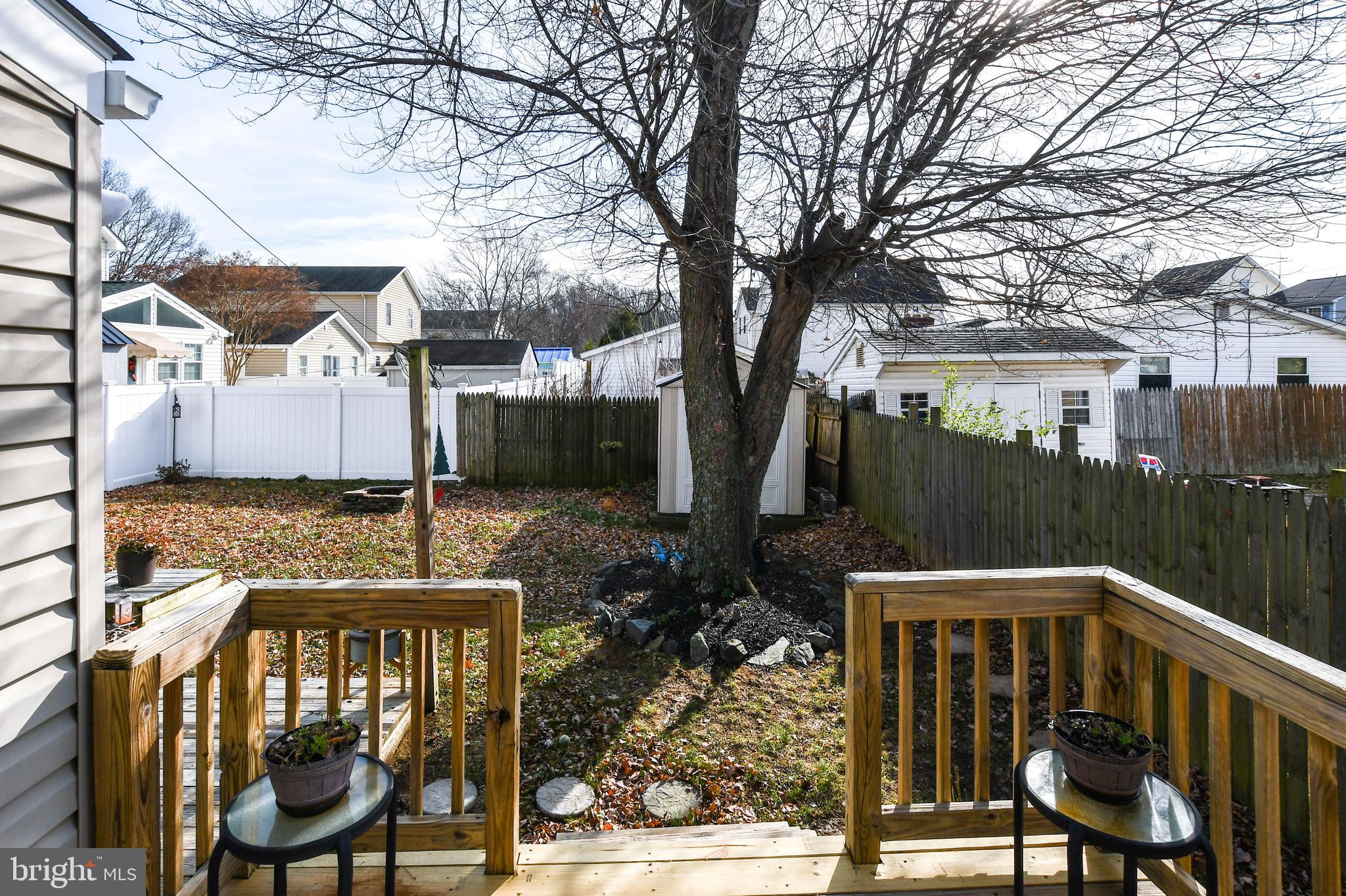 823 Selby Boulevard Edgewater, MD 21037 - Photo 30 of 40 a view of a chairs and tables in the patio