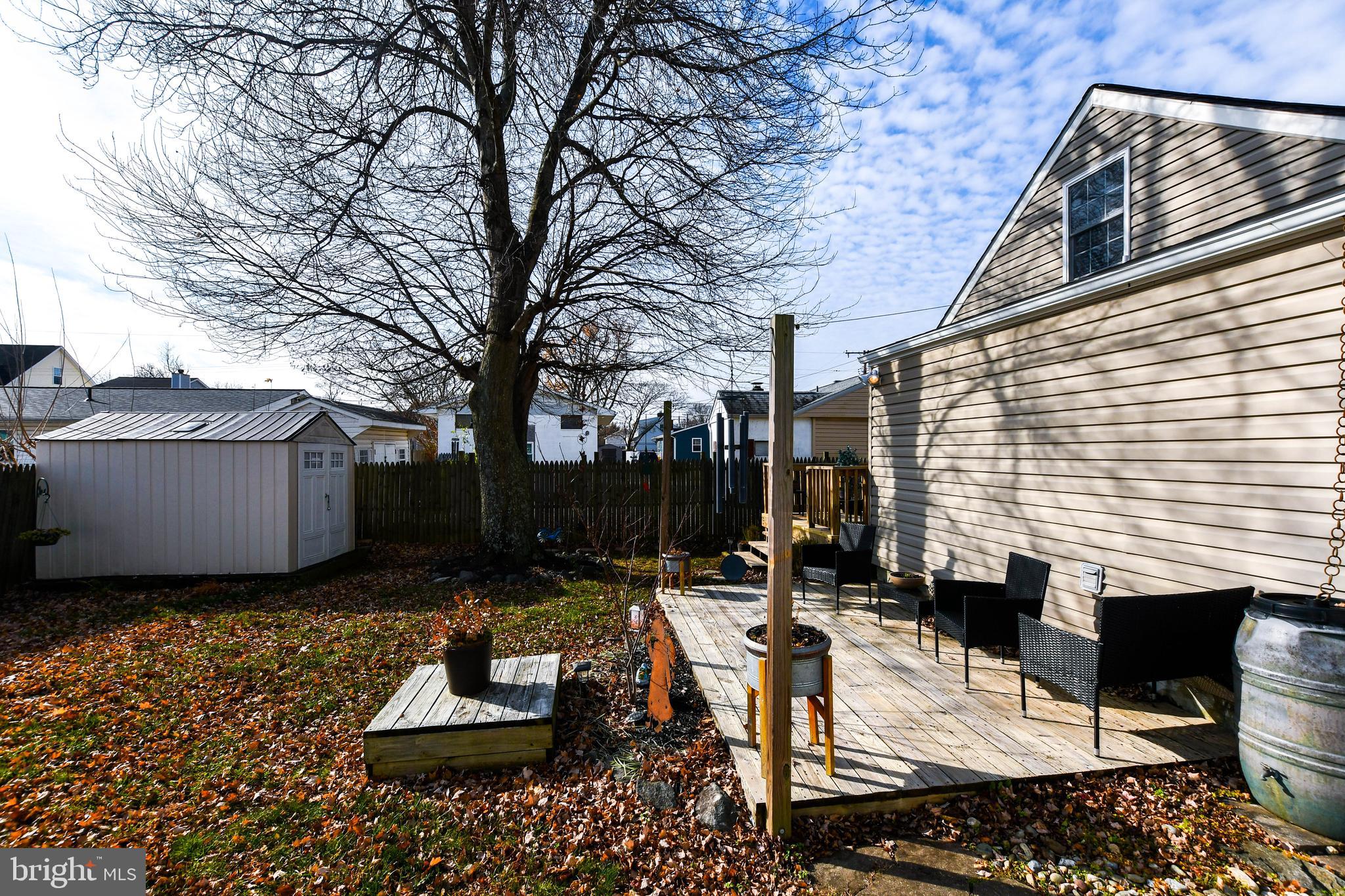 823 Selby Boulevard Edgewater, MD 21037 - Photo 32 of 40 a view of a backyard with sitting area