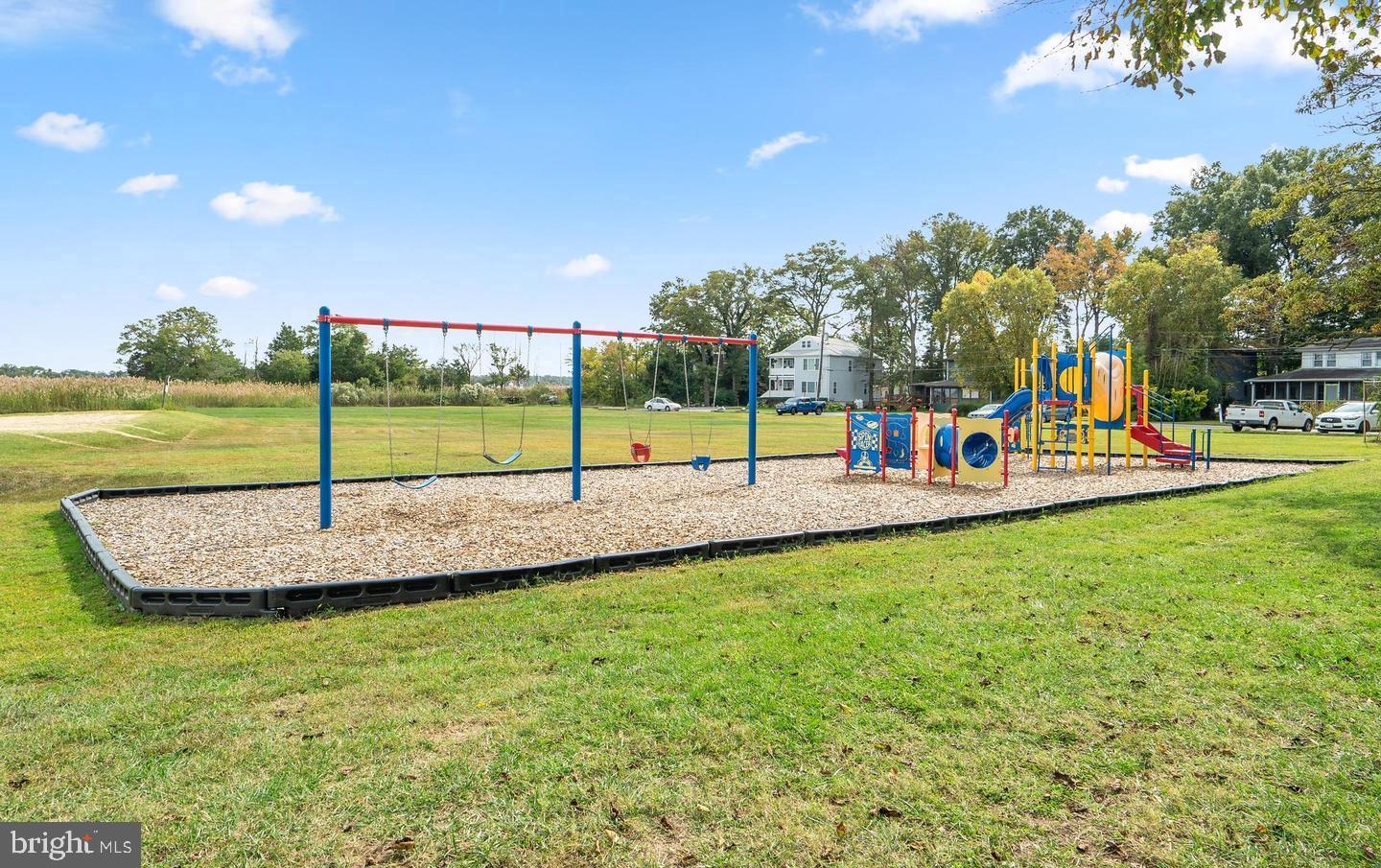 823 Selby Boulevard Edgewater, MD 21037 - Photo 35 of 40 a view of a park with swings and slides