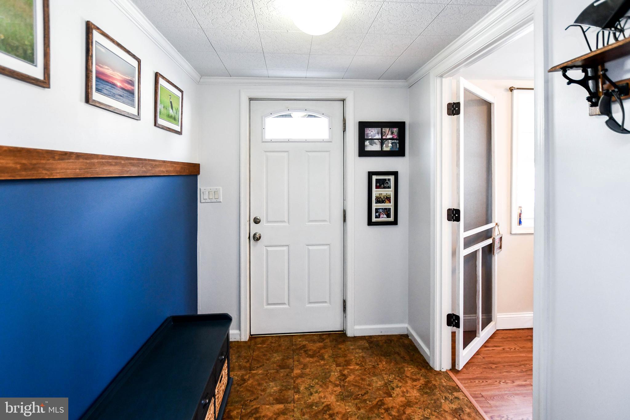 823 Selby Boulevard Edgewater, MD 21037 - Photo 6 of 40 a view of a bedroom with a wardrobe