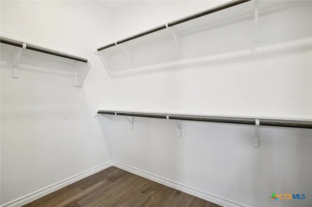 a view of a room with racks on the wall