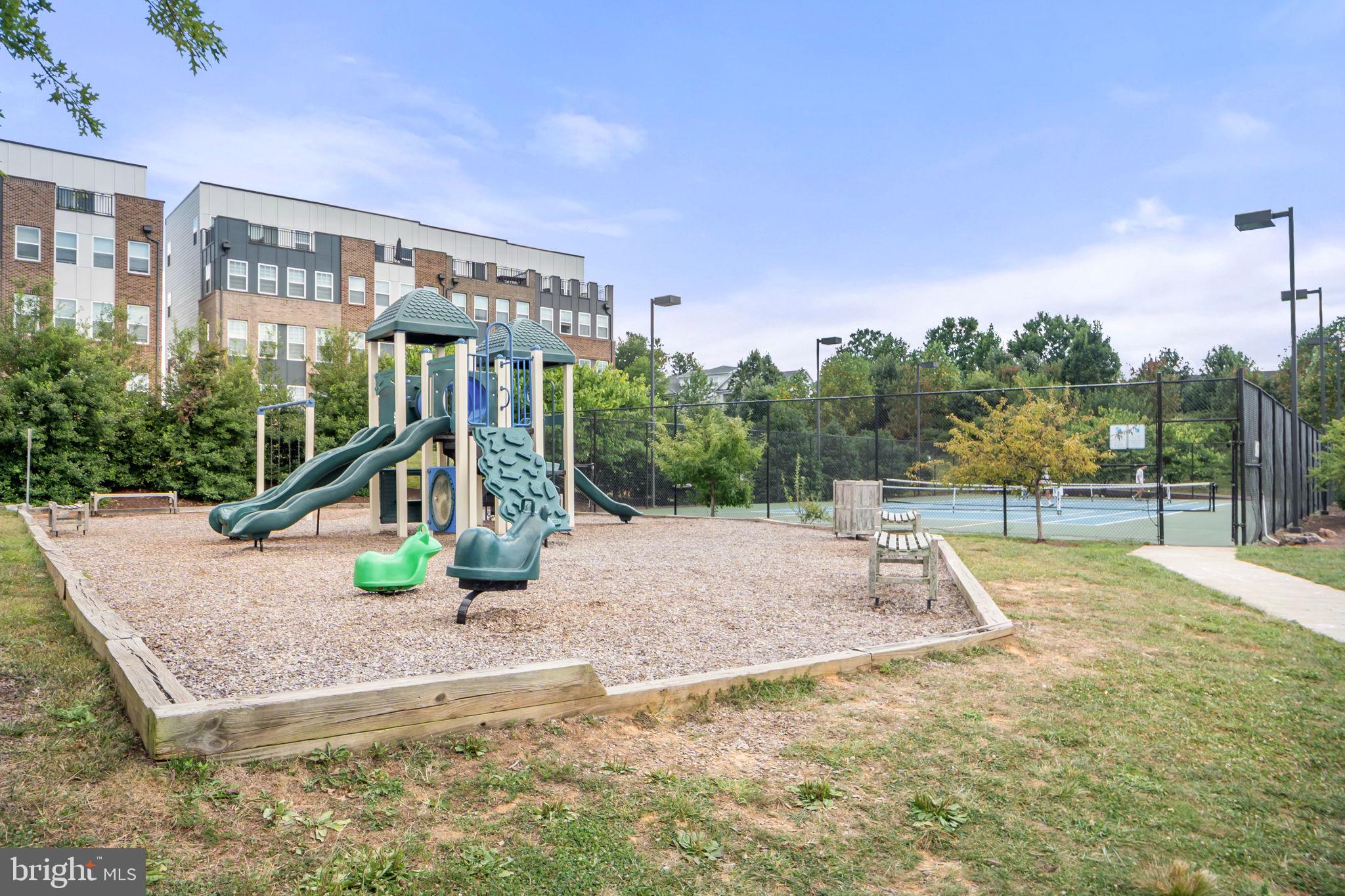 210 Decoverly Drive, Unit 106 Gaithersburg, MD 20878 - Photo 36 of 59 a view of a house with basketball court