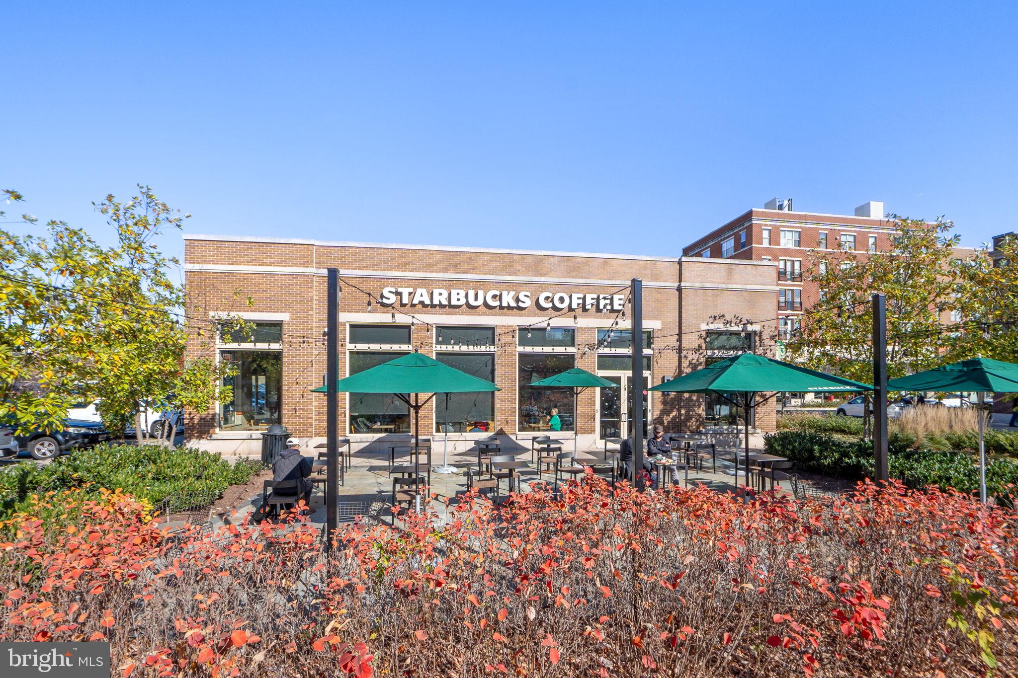 210 Decoverly Drive, Unit 106 Gaithersburg, MD 20878 - Photo 43 of 59 a view of a chairs and table in patio