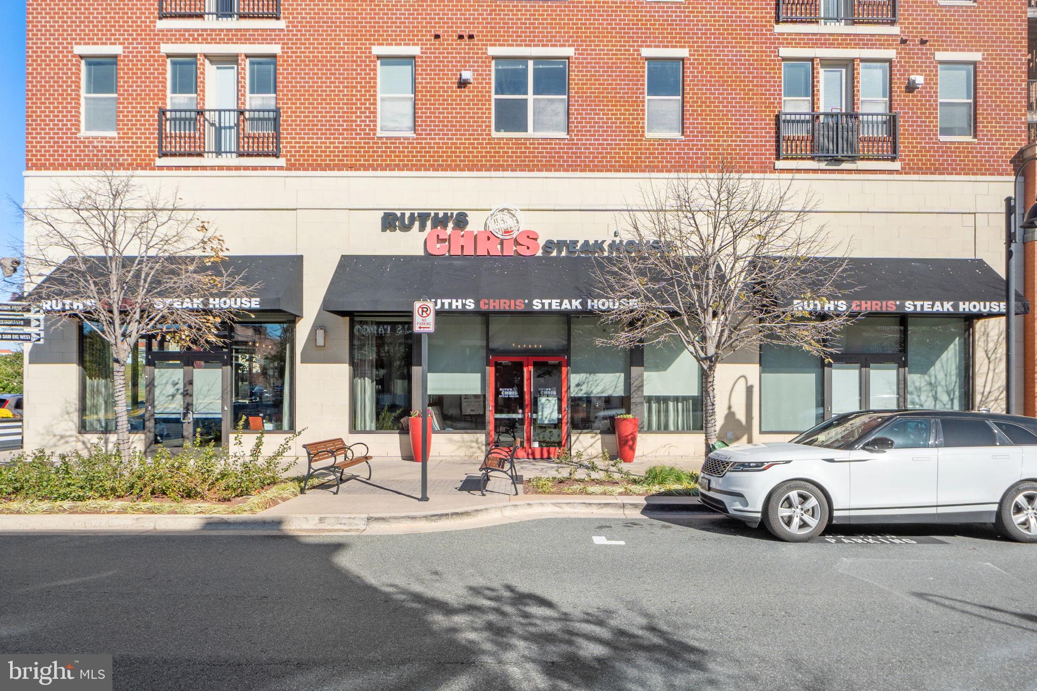 210 Decoverly Drive, Unit 106 Gaithersburg, MD 20878 - Photo 47 of 59 a car parked in front of a building