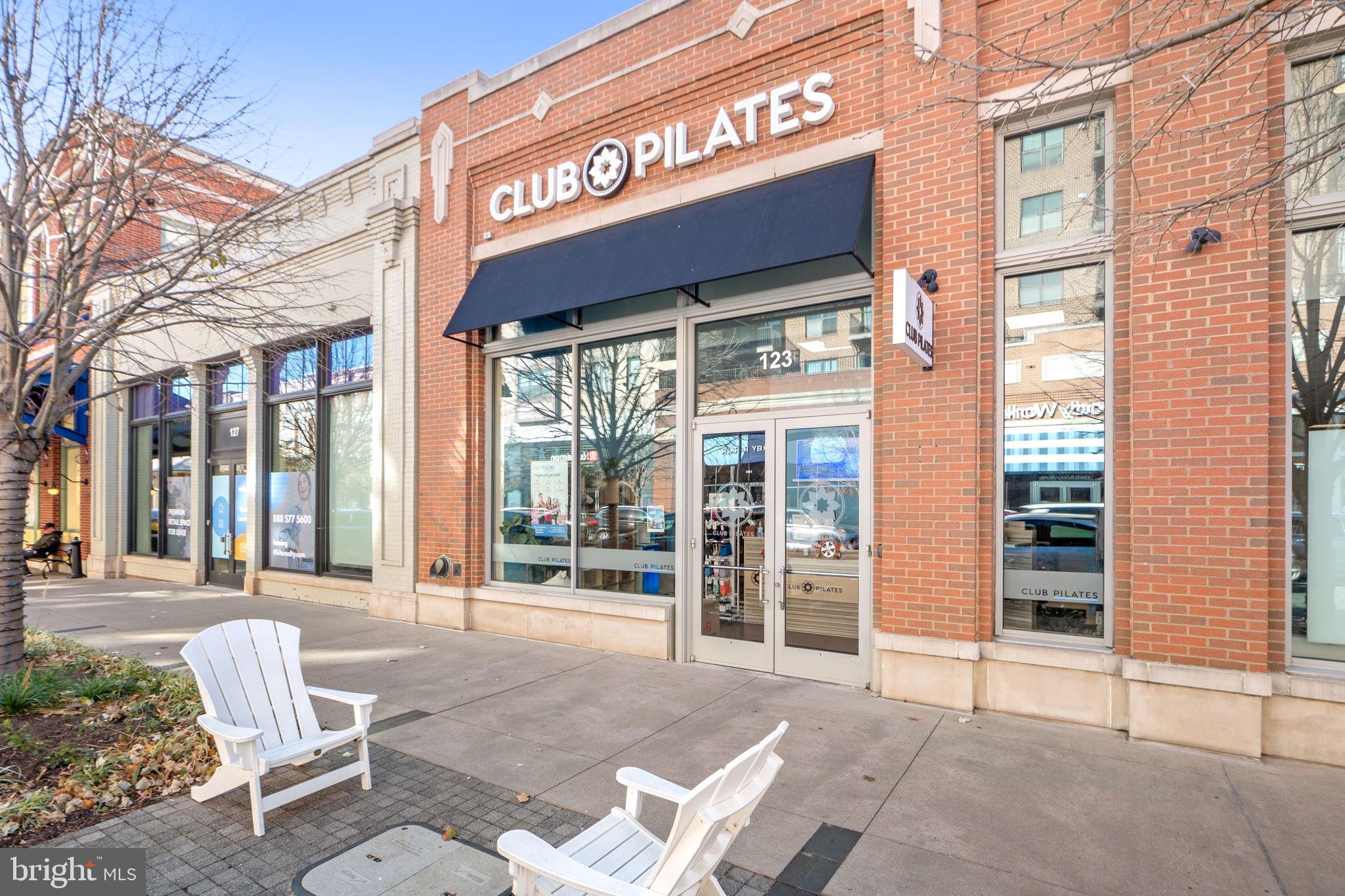 210 Decoverly Drive, Unit 106 Gaithersburg, MD 20878 - Photo 48 of 59 a view of a building with a glass door