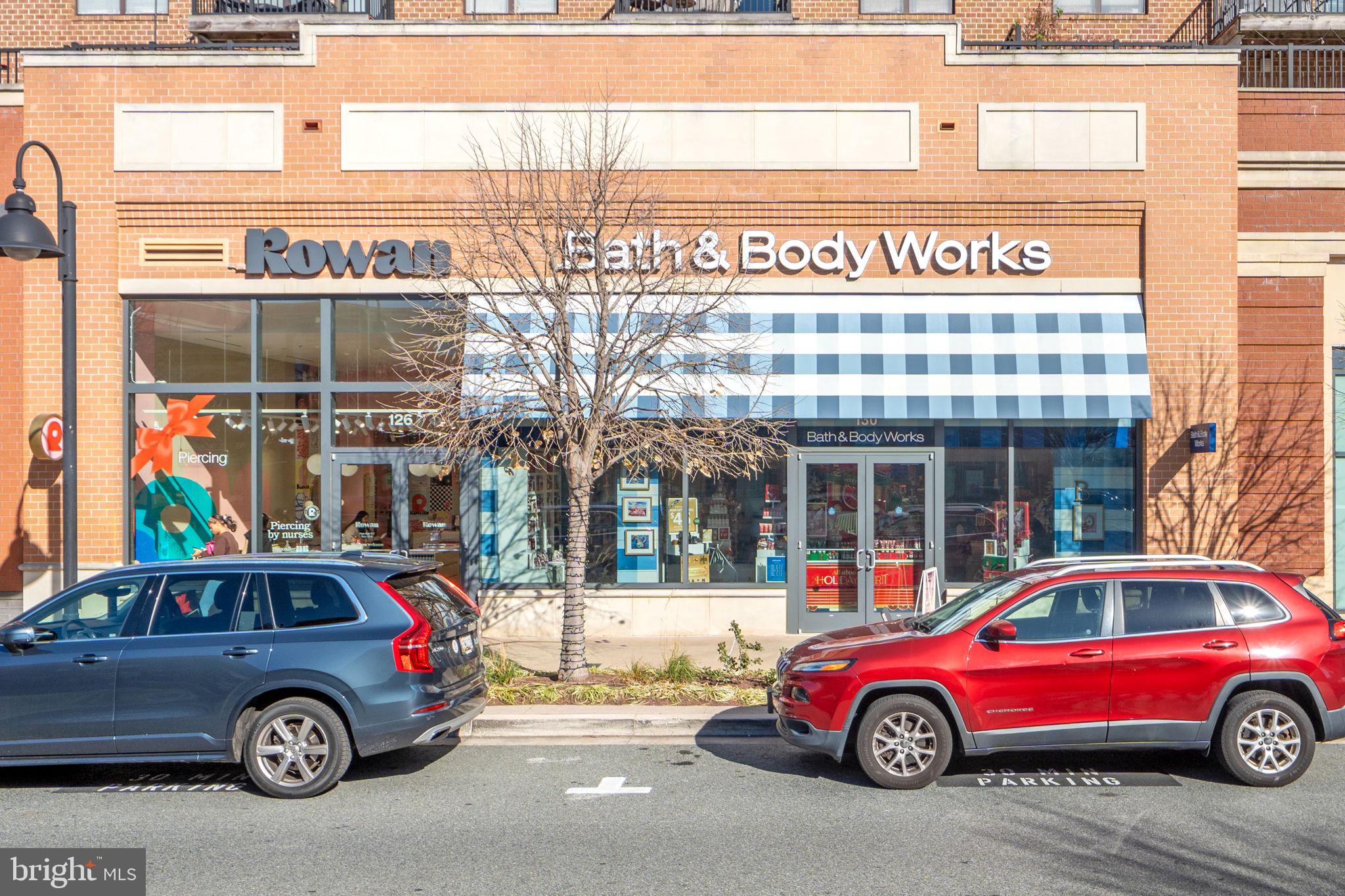 210 Decoverly Drive, Unit 106 Gaithersburg, MD 20878 - Photo 49 of 59 a car parked in front of a building