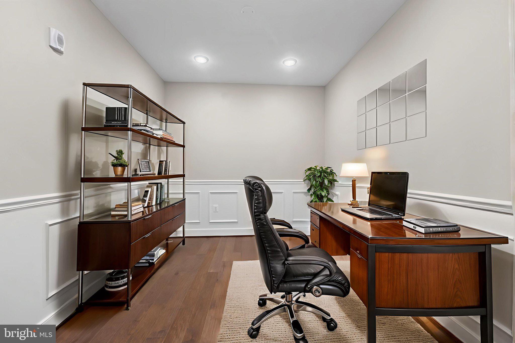 210 Decoverly Drive, Unit 106 Gaithersburg, MD 20878 - Photo 9 of 59 a workspace with furniture