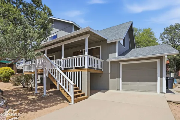 a front view of a house with balcony