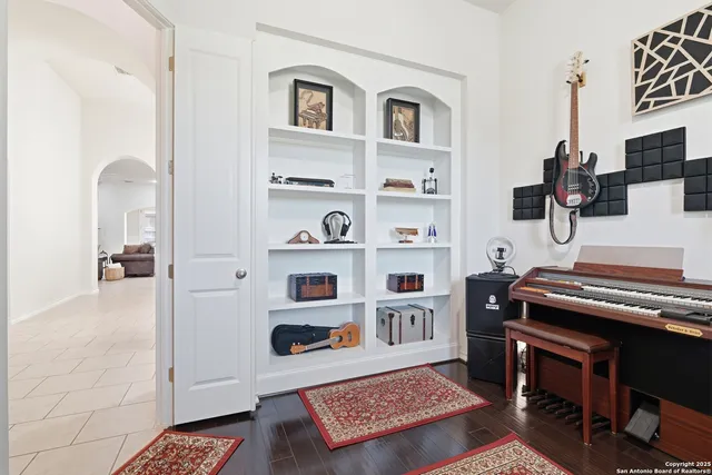 a bathroom with a sink toilet and mirror