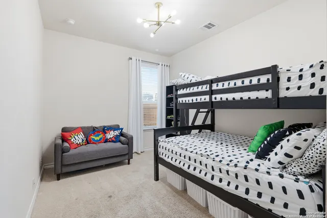 a view of a hallway with staircase