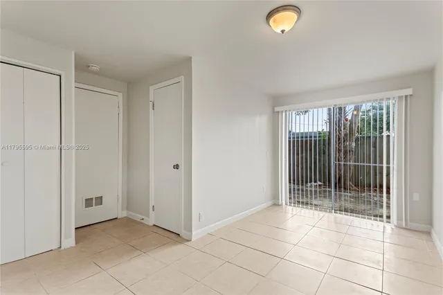 a view of livingroom with front door