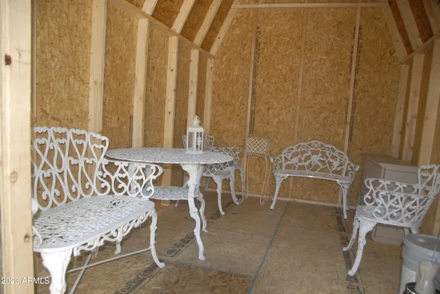 a view of a house with a tree