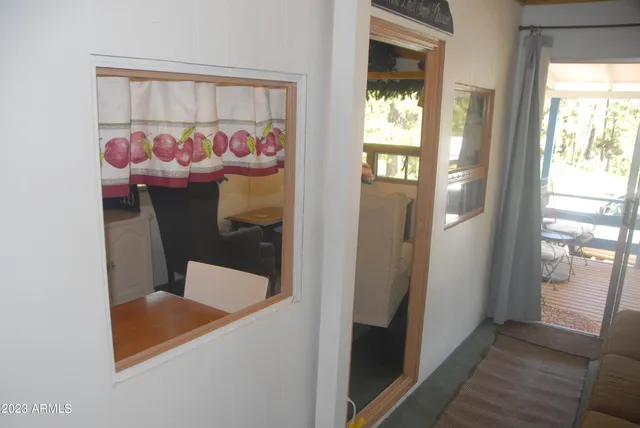 a bathroom with a painting on the wall and a sink